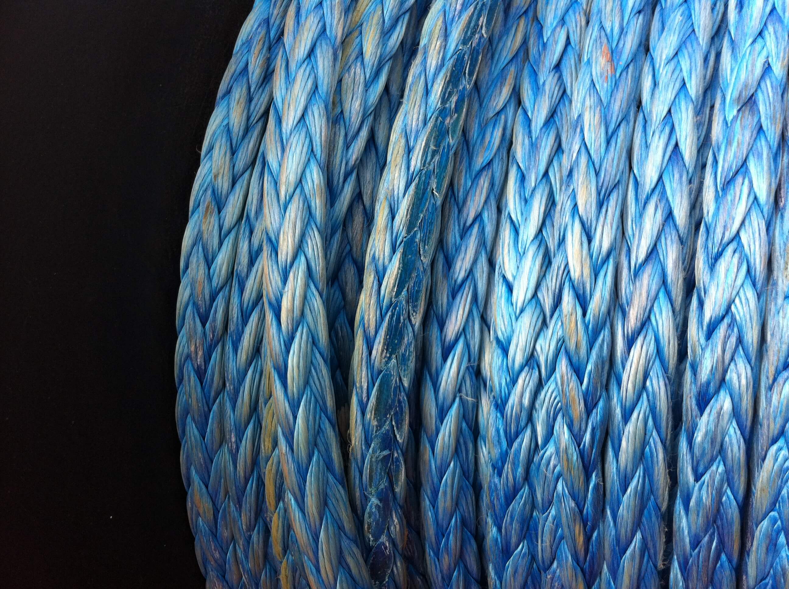 Yellow crane winch equipped with Samson Rope for industrial lifting